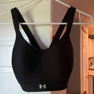 Under Armour Black sports bra, built in padding, size Large. Like new.
